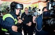 Erico Galeano (C) era trasladado hasta el Departamento Judicial de la Policía, donde permanece hasta ahora.