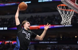 DALLAS, TEXAS - MARCH 30: Cooper Flagg #32 of the Dallas Mavericks dunks during the second quarter against the Minnesota Timberwolves at American Airlines Center on March 30, 2026 in Dallas, Texas. NOTE TO USER: User expressly acknowledges and agrees that, by downloading and or using this photograph, user is consenting to the terms and conditions of the Getty Images License Agreement. Sam Hodde/Getty Images/AFP (Photo by Sam Hodde / GETTY IMAGES NORTH AMERICA / Getty Images via AFP)
