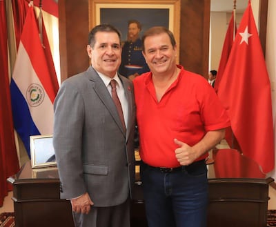 Horacio Cartes y Guido González.