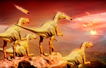 Dinosaurios ven caer meteoritos, imagen ilustrativa.