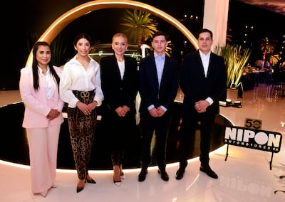 Fiorella Villanueva, Mística Peña, Virina Villanueva, Jesús Peña y Ariel Ferreira en la fiesta aniversario de Nipon Automotores.