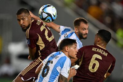TOPSHOT - Venezuela's forward Salomon Rondon (L) heads the ball during the 2026 FIFA World Cup South American qualifiers football match between Venezuela and Argentina, at the Monumental de Maturin stadium in Maturin, Venezuela, on October 10, 2024. (Photo by JUAN BARRETO / AFP)