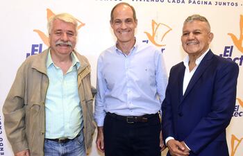 Ricardo Canese, Jorge Mendelzon y Pablo León Burián, director de editorial El Lector.