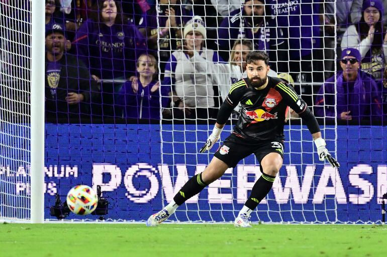 ORLANDO, FLORIDA - NOVEMBER 30: Carlos Miguel Coronel #31 of the New York Red Bulls defends a shot during the first half against Orlando City at Exploria Stadium on November 30, 2024 in Orlando, Florida.   Julio Aguilar/Getty Images/AFP (Photo by Julio Aguilar / GETTY IMAGES NORTH AMERICA / Getty Images via AFP)