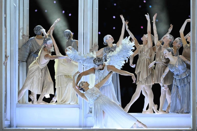 Italian ballet dancers Antonella Albano and Claudio Coviello perform during the opening ceremony of the Milano Cortina 2026 Winter Olympic Games at the San Siro stadium in Milan, northern Italy, on February 6, 2026. (Photo by WANG Zhao / AFP)