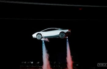 A grab taken on October 16, 2026 from a live feed released by Tesla shows the company unveiling on October 15 its next-generation Roadster electric car in McGregor, Texas, United States. (Photo by Tesla / AFP) / RESTRICTED TO EDITORIAL USE - MANDATORY CREDIT "AFP PHOTO / TESLA" - HANDOUT - NO MARKETING NO ADVERTISING CAMPAIGNS - DISTRIBUTED AS A SERVICE TO CLIENTS