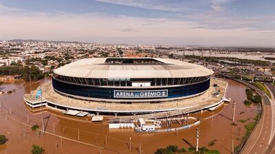 TOPSHOT - Aerial view of the Arena do Gremio Stadium of the Brazilian football team Gremio in Porto Alegre, Rio Grande do Sul state, Brazil, on May 7, 2024. Since the unprecedented deluge started last week, at least 85 people have died and more than 150,000 were ejected from their homes by floods and mudslides in Rio Grande do Sul state, authorities said. (Photo by CARLOS FABAL / AFP)