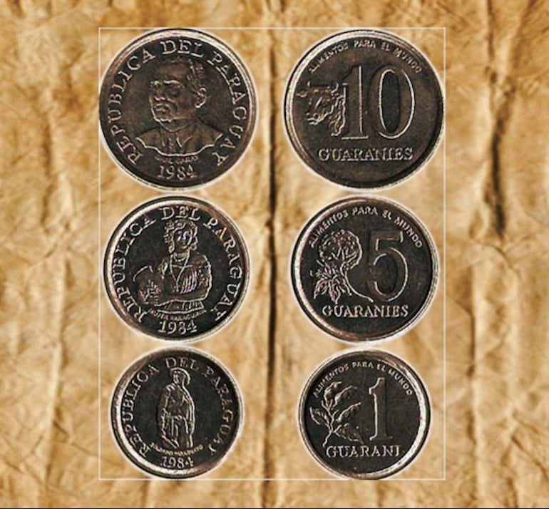 Monedas de 1, 5 y 10 guaraníes sobre fondo arrugado, con inscripciones que mencionan 'Alimentos para el mundo'.