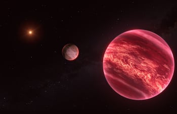 Representación artística del sistema CD-35 2722. El candidato a satélite orbita una enana marrón, que a su vez gira alrededor de una estrella.