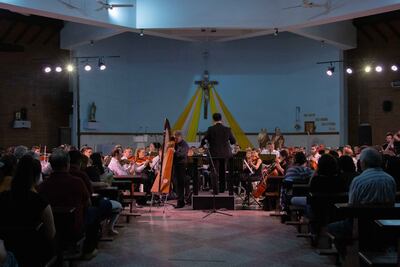 La Orquesta Sinfónica de la Ciudad de Asunción (OSCA).