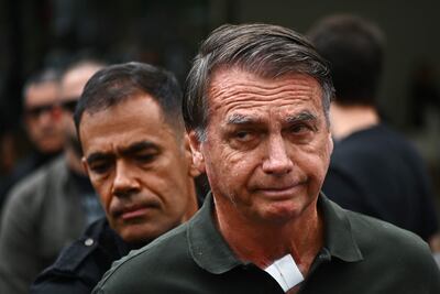 El expresidente de Brasil, Jair Bolsonaro (C). (archivo)