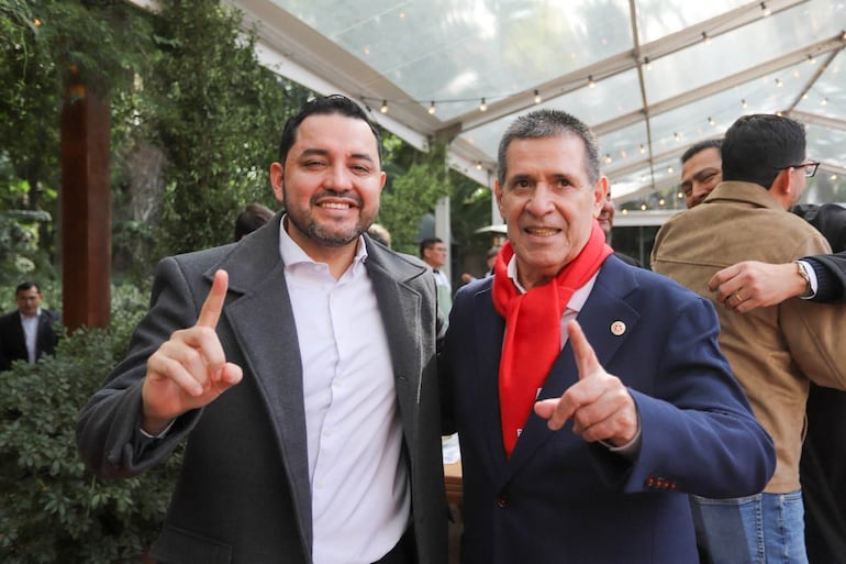 Luis Bello y Horacio Cartes.