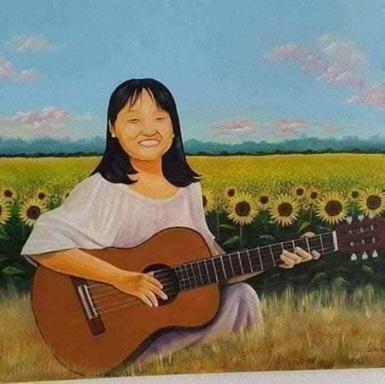Mujer con blusa clara sonríe, sosteniendo una guitarra en un campo de girasoles lleno de flores amarillas.