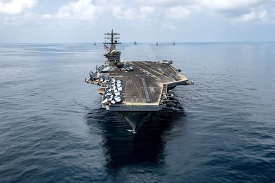 Fotografía cedida por el Comando Sur de Estados Unidos que muestra el portaaviones USS Nimitz (CVN 68) y el destructor de misiles guiados USS Gridley (DDG 101).