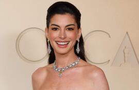 La actriz Anne Hathaway anunció hoy que está en la dulce espera de su tercer hijo. (ANGELA WEISS / AFP)