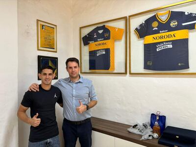 Manuel Romero y el presidente Norman Rieder.