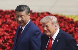 El presidente chino Xi Jinping (a la izquierda) y el estadounidense Donald Trump, hoy en Pekín.