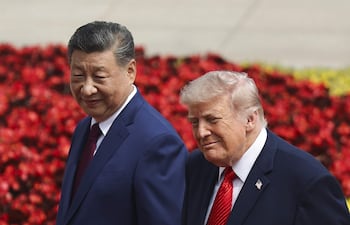 El presidente chino Xi Jinping (a la izquierda) y el estadounidense Donald Trump, hoy en Pekín.