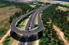 Vista aérea de la Av. Silvio Pettirossi, con trazado de carretera sin personas visibles, rodeada de vegetación.