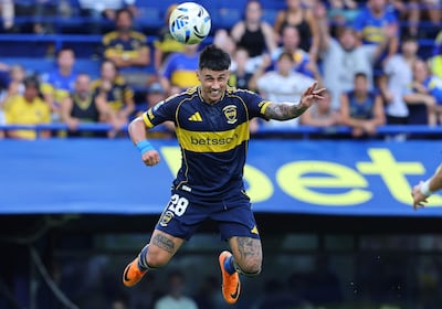Boca Juniors' Paraguayan forward #28 Adam Bareiro heads the ball to score his team's second goal during the Argentine Professional Football League 2026 Apertura Tournament match between Boca Juniors and Gimnasia y Esgrima de Mendoza at La Bombonera Stadium in Buenos Aires on February 28, 2026. (Photo by ALEJANDRO PAGNI / AFP)