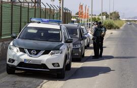 Agentes de la Guardia Civil controlan el acceso a Torre Pacheco en todas las entradas al municipio. La localidad murciana de Torre Pacheco cumple seis días desde el inicio de los disturbios racistas organizados por grupos de ultraderecha.