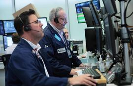 NEW YORK, NEW YORK - JUNE 10: Traders work on the floor of the New York Stock Exchange during afternoon trading on June 10, 2026 in New York City. Stocks were significantly down at the closing of the market with the Dow Jones losing over 800 points after U.S. President Donald Trump stated that negotiations with Iran were taking too long and threatened more action causing oil prices to rise. Michael M. Santiago/Getty Images/AFP (Photo by Michael M. Santiago / GETTY IMAGES NORTH AMERICA / Getty Images via AFP)