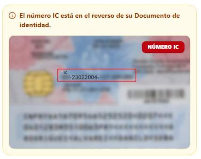 Documento de identidad con número IC visible en el reverso, sobre una superficie plana.