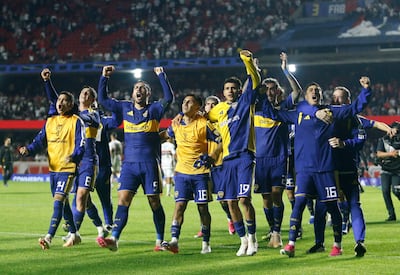 Boca Juniors players acknowledge their fans at the end of the Copa Sudamericana quarter-final second leg football match between Brazil's Sao Paulo and Argentina's Boca Juniors at the Morumbi stadium in Sao Paulo, Brazil on September 15, 2026. (Photo by Miguel SCHINCARIOL / AFP)