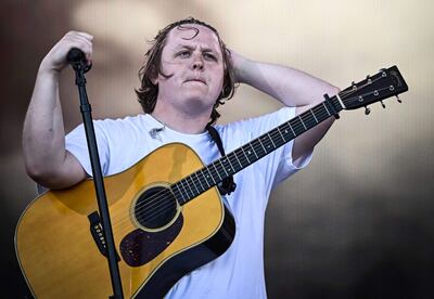 (FILES) Scottish singer Lewis Capaldi performs on The Pyramid Stage on day 4 of the Glastonbury festival in the village of Pilton in Somerset, southwest England, on June 24, 2023. Scottish singer-songwriter Lewis Capaldi on June 27 said he was taking a break from performing, after struggling to finish his set at the Glastonbury festival. The crowd at the event on Saturday stepped in to sing the lyrics to his final songs after Capaldi, 26, suffered vocal problems. (Photo by Oli SCARFF / AFP)