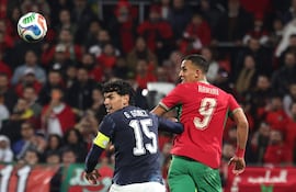 Morocco's Soufiane Rahimi (R) fights for the ball with Paraguay's Gustavo Gomez during the friendly football match between Morocco and Paraguay at the Stade Bollaert-Delelis in Lens, northern France on March 31, 2026. (Photo by Francois LO PRESTI / AFP)
