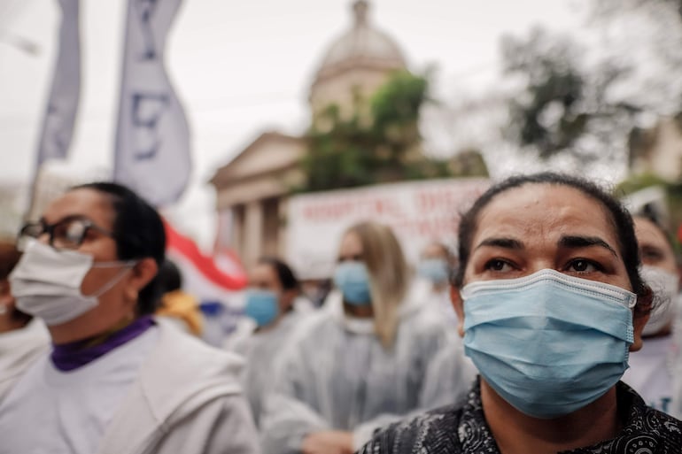 Enfermeras participan en una marcha. 