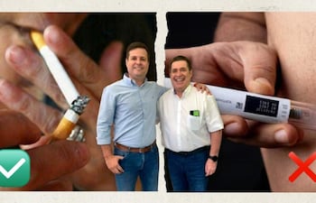 Horacio Cartes en camisa azul y un hombre en camiseta blanca sonríen, con una mano sosteniendo un cigarrillo encendido.