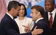 El presidente Santiago Peña (izq.) conversa con su homólogo de Francia, Emmanuel Macron, a fines de 2024, en Río de Janeiro. EFE/ Andre Coelho.