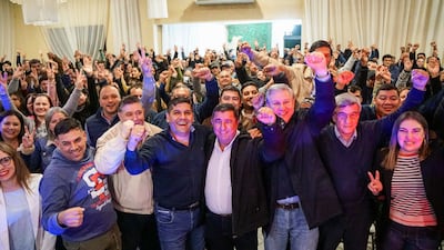 Luis Dimartino y Luis Zárate (centro) ayer en el acto de unidad en Itá.