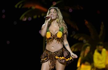 Karol G está feliz con los dos nuevos proyectos sociales de su fundación. (NELSON ALMEIDA / AFP)