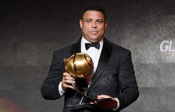 (FILES) Brazilian retired footballer, Ronaldo Luis Nazario de Lima aka Ronaldo, poses after receiving a "Player Career Award" during the 10th edition of the Dubai Globe Soccer Awards on January 3, 2019 in Dubai. Football legend Ronaldo "The Phenomenon" expressed his intention to be the next president of the Brazilian Football Confederation (CBF), presenting himself as an "alternative for change" in the face of the "deep crisis" of football in Brazil, during an interview to the website Globoesporte on December 16, 2024. (Photo by Fabio FERRARI / La Presse / AFP) / Italy OUT - China OUT