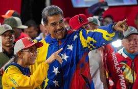 El expresidente de Venezuela, Nicolás Maduro (d), con Cilia Flores. (archivo)