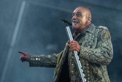(FILES) Till Lindemann, lead vocalist of the band Rammstein, performs on stage of the HDI-Arena stadium in Hanover, northern Germany, during a concert of the band's "Europa Stadion Tour" on July 2, 2019. Germany's families minister has called for better protection for fans at concerts amid a wave of sexual assault allegations against the frontman of veteran rock band Rammstein. Several women have come forward in recent days to accuse Till Lindemann, 60, of grooming and sexually assaulting them at after-show parties. (Photo by Christophe Gateau / DPA / AFP) / Germany OUT / RESTRICTED TO EDITORIAL USE IN CONNECTION WITH REPORTS OF RAMMSTEIN'S EUROPA STADION TOUR 2019