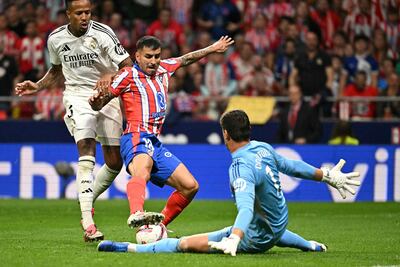 Atletico Madrid's Argentine forward #10 Angel Correa prepares to score during the Spanish league football match between Club Atletico de Madrid and Real Madrid CF at the Metropolitano stadium in Madrid on September 29, 2024. (Photo by JAVIER SORIANO / AFP)