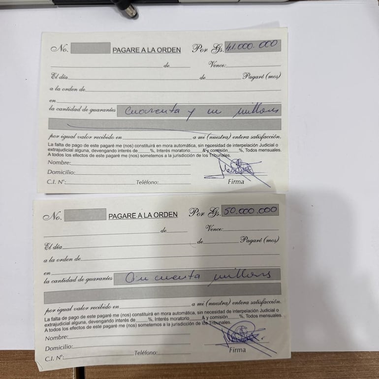 Pagarés en blanco, pero firmados y montos de dinero a pagar especificados. En uno por G. 41.000.000 y en otro por G. 50.000.000.