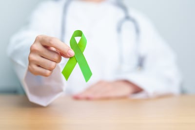 Lazo verde, símbolo del Día Mundial de la Salud Mental.