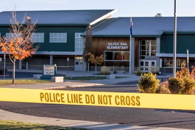 Police tape blocks access to Silver Rail Elementary School a day after a shooting at the school in Bend, Oregon, on October 16, 2026. Three children and one teacher were shot dead at an elementary school on October 15 in the northwestern US state of Oregon, police said, adding that the assailant was a 16-year-old who was killed by an armed bystander. (Photo by Payton Bruni / AFP)