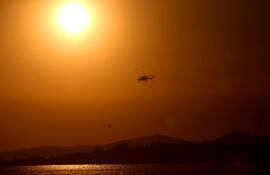 Un sol abrasador tiñe de naranja el cielo. El Niño provocará temperaturas más altas de lo normal hasta mayo, según la ONU.