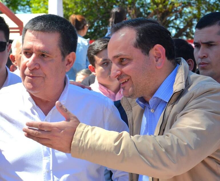 Horacio Cartes y Sebastian "Cheba" Remesowski .