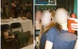 Estudiantes sentados alrededor de una mesa en un restaurante, conversando con tranquilidad sobre el proyecto de ley.