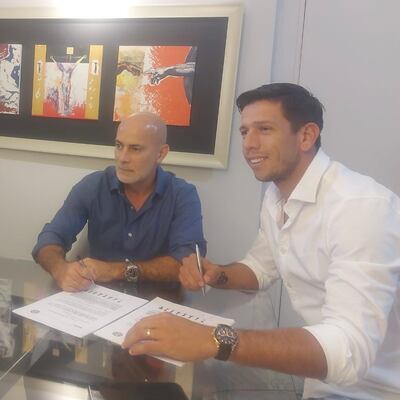 El presidente de Olimpia, Miguel Cardona, y el arquero, Juan Espínola.