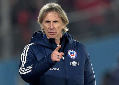 (FILES) Chile's Argentine coach Ricardo Gareca gestures during the International friendly football match between Chile and Paraguay at the Nacional stadium in Santiago on June 11, 2024. Peruvian goalkeeper Pedro Gallese downplayed on June 20, 2024, that Chile comes in as a favorite over Peru and said they know the tactical system that Chile coach Ricardo Gareca will use in Friday's Group A opener at the Copa America USA-2024. (Photo by RODRIGO ARANGUA / AFP)
