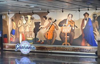 Mural que retrata episodios de la vida de José Asunción Flores, creador de la guarania, y que se encuentra en el hall de acceso al teatro del Banco Central del Paraguay.