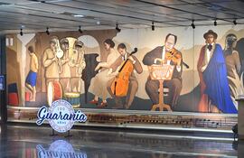 Mural que retrata episodios de la vida de José Asunción Flores, creador de la guarania, y que se encuentra en el hall de acceso al teatro del Banco Central del Paraguay.