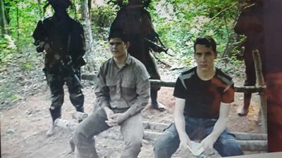 Única prueba de vida de Edelio Morínigo, en octubre de 2014, junto a Arlan Fick (liberado dos meses después).